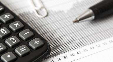 calculator and black pen