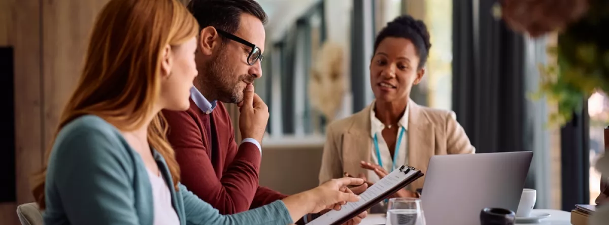 couple reviewing insurance papers