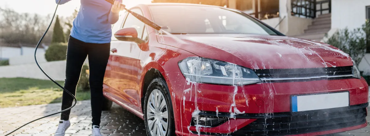 car being washed in driveway