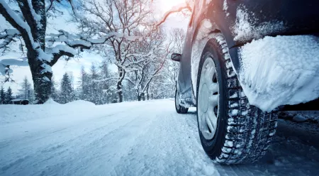 car driving on a snow covered road