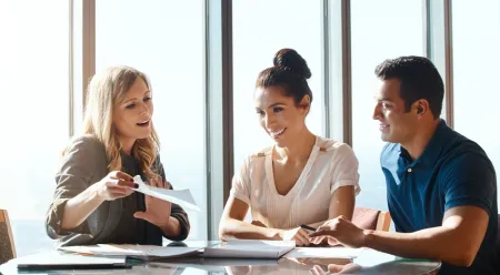 people reviewing insurance paperwork