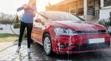 car being washed in driveway
