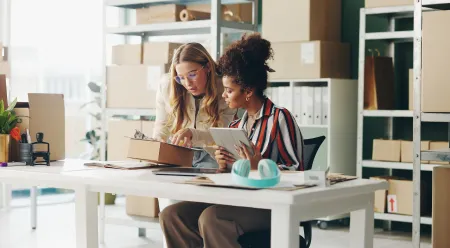 two women at desk