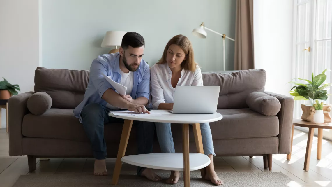 couple looking over paperwork